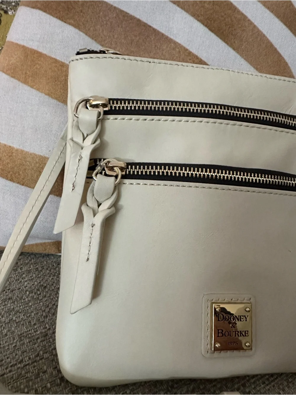 Dooney & Bourke Cream Triple-Zip Leather Crossbody